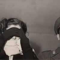 Rina Fort si copre il viso durante il processo